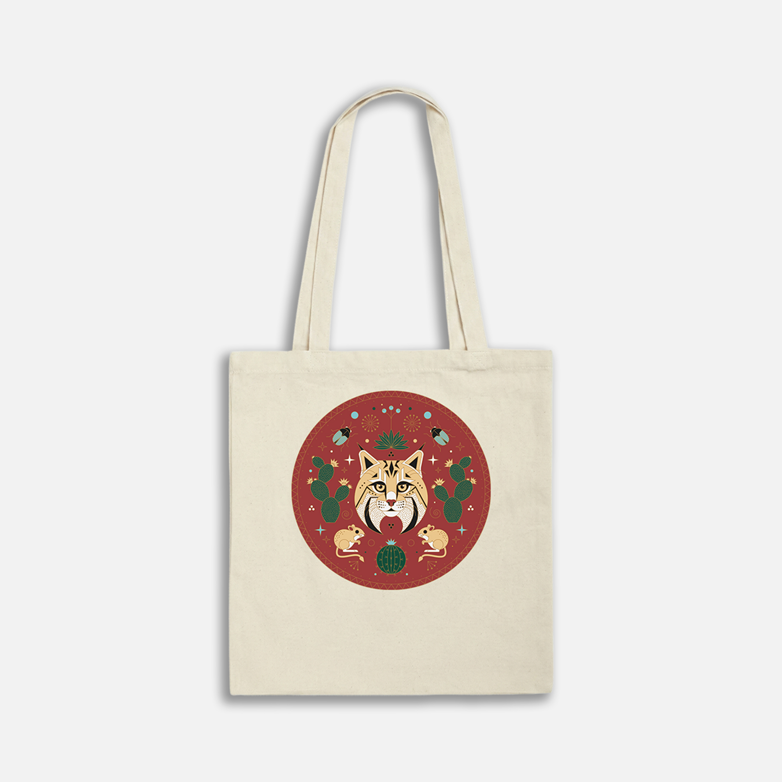Tote bag with intricate animal design, featuring a feline illustration surrounded by plants and stars on a red circle background.