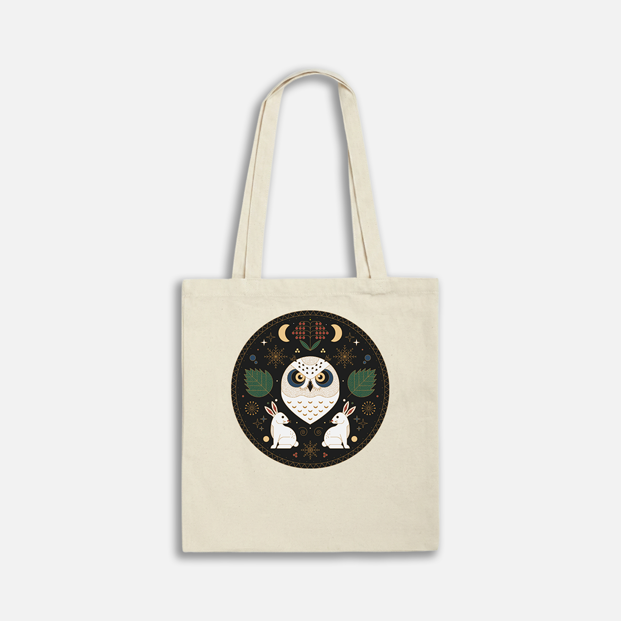 Canvas tote bag with a whimsical owl and rabbit design in a circular pattern, featuring stars and leaves.